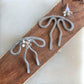 Coquette Bow: Hand-formed aluminum wire earring jackets