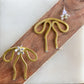Coquette Bow: Hand-formed aluminum wire earring jackets