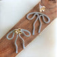 Coquette Bow: Hand-formed aluminum wire earring jackets