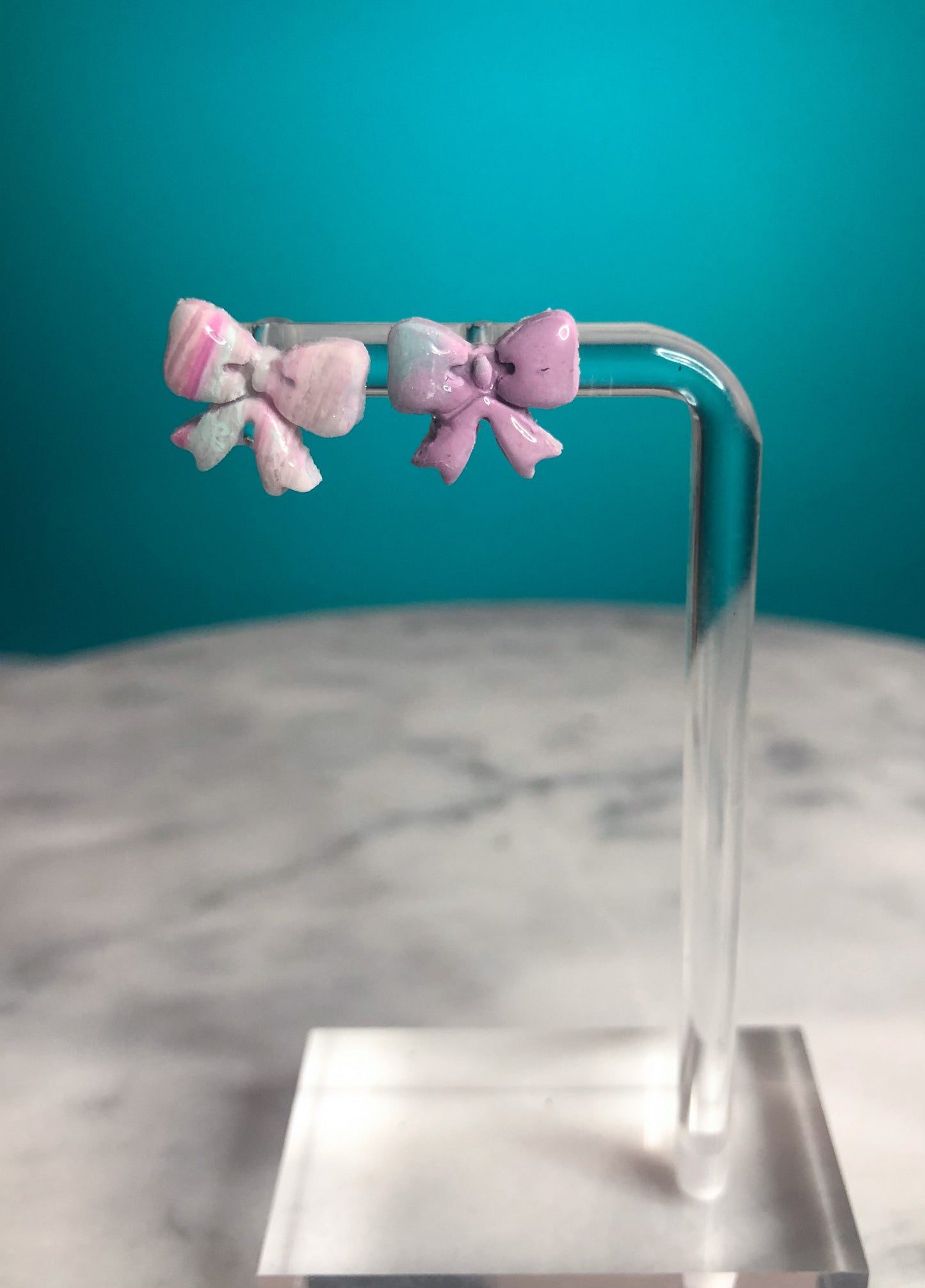 Pretty in Pink- Tiny bow stud with hints of lilac, pink snd teal